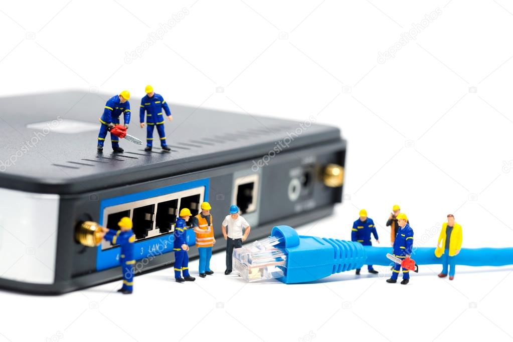 depositphotos_77623582-stock-photo-technicians-connecting-network-cable-network
